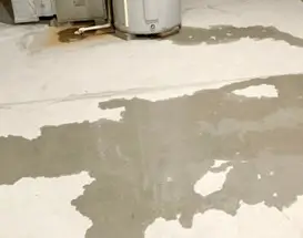 How do I stop moisture in the concrete floor of my Milwaukee, WI home